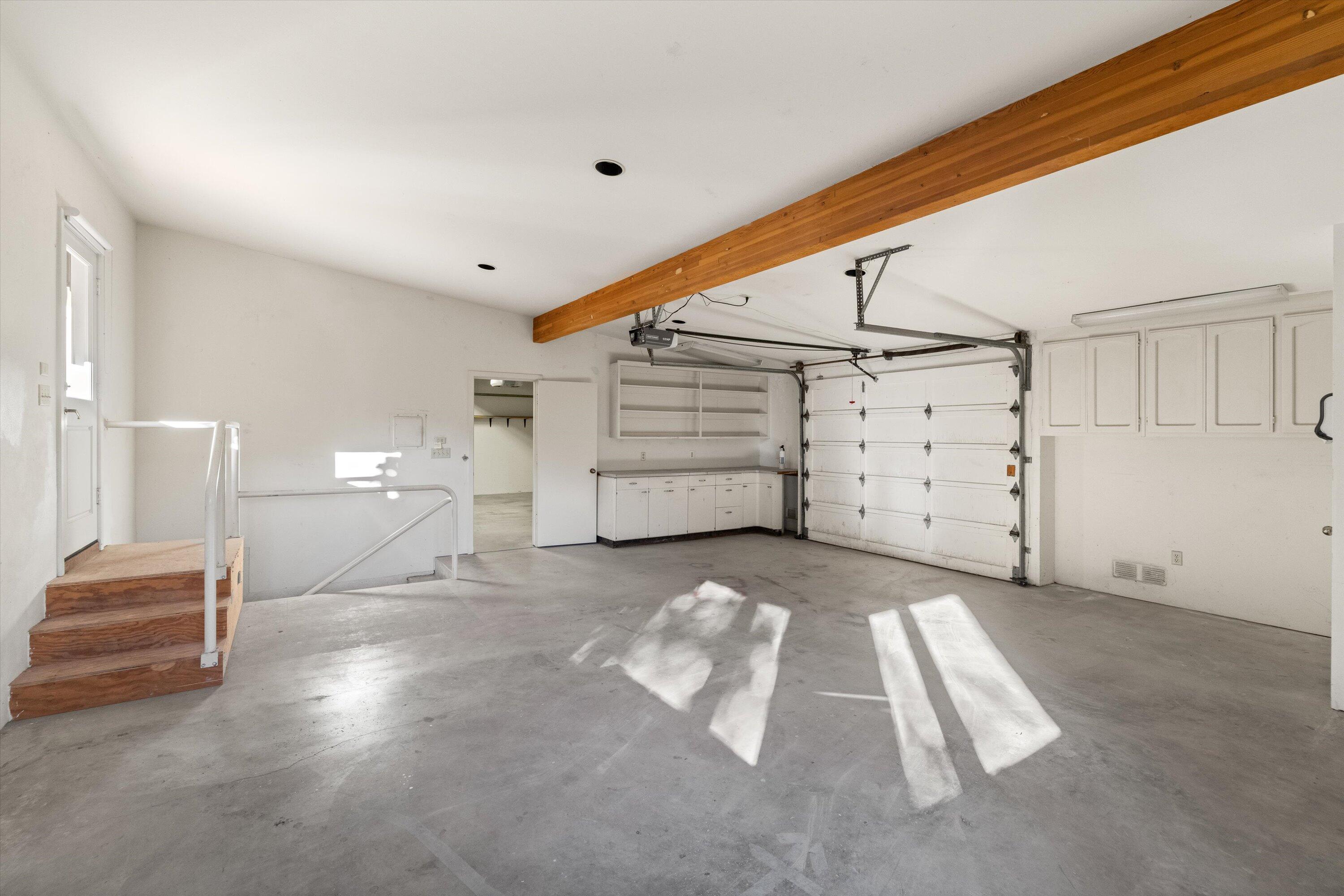 1235 Mission Ridge Road Santa Barbara, CA 93103 - Photo 26 of 27 a view of a livingroom with closet and stairs