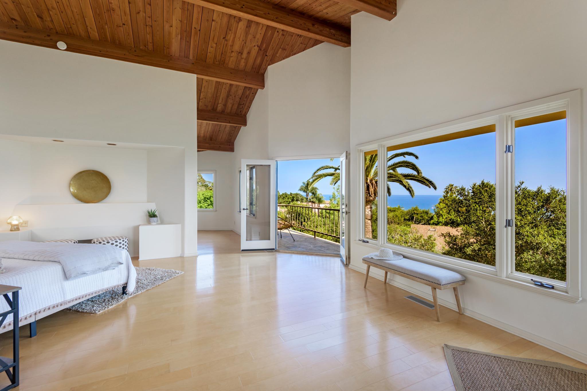 1235 Mission Ridge Road Santa Barbara, CA 93103 - Photo 27 of 27 a view of a bedroom with furniture and window
