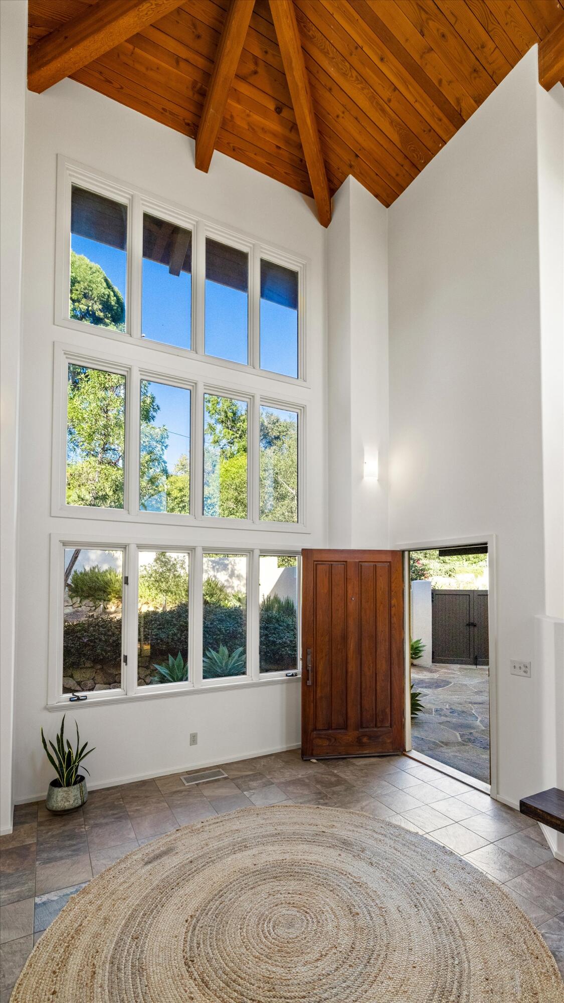 1235 Mission Ridge Road Santa Barbara, CA 93103 - Photo 5 of 27 a view of a livingroom with furniture and staircase