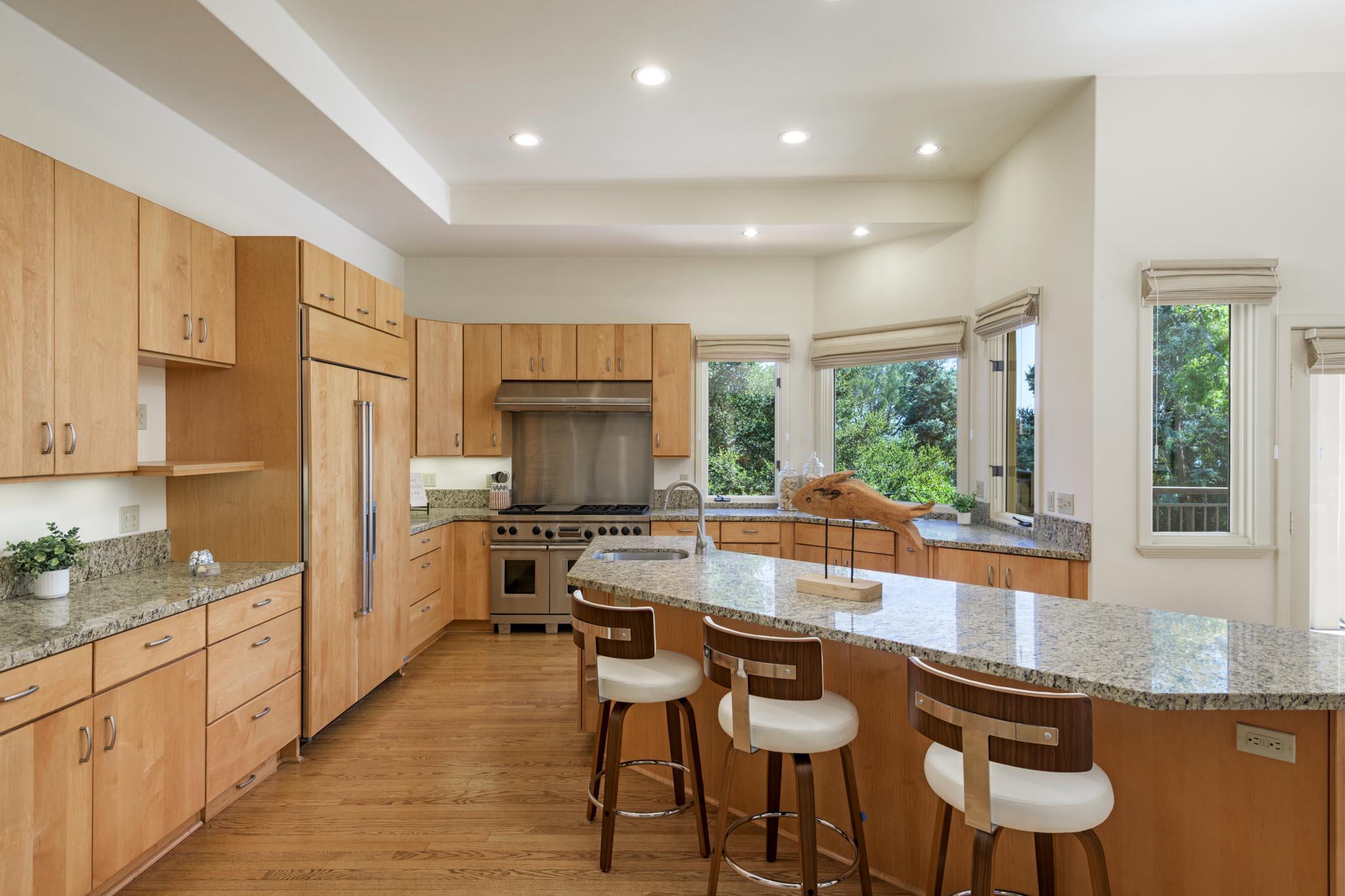 1235 Mission Ridge Road Santa Barbara, CA 93103 - Photo 8 of 27 a kitchen with granite countertop counter space a sink appliances and cabinets