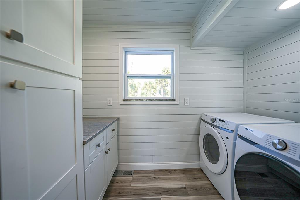 1450 New Point Comfort Road Englewood, FL 34223 - Photo 19 of 50 a utility room with dryer and washer