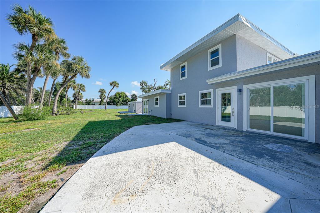 1450 New Point Comfort Road Englewood, FL 34223 - Photo 33 of 50 front view of a house with a yard