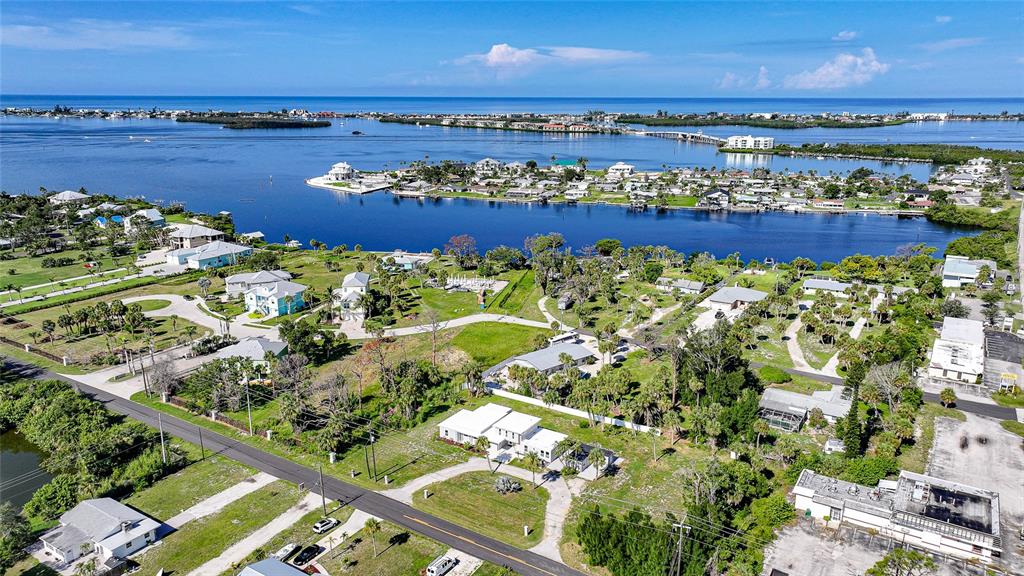 1450 New Point Comfort Road Englewood, FL 34223 - Photo 47 of 50 a view of a city with an ocean view