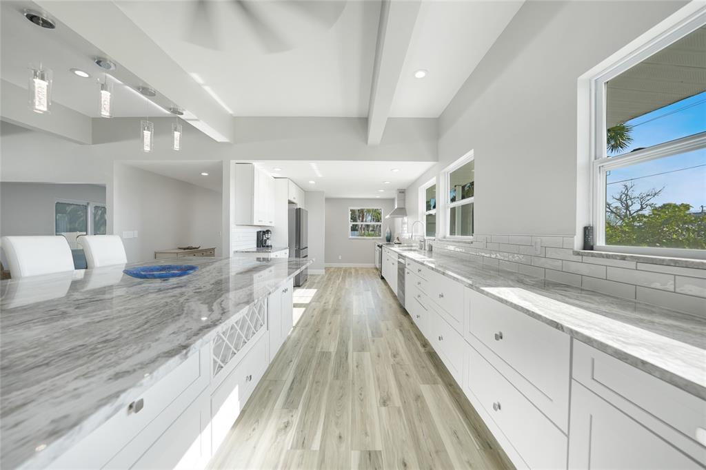 1450 New Point Comfort Road Englewood, FL 34223 - Photo 6 of 50 a view of a living room and bathroom