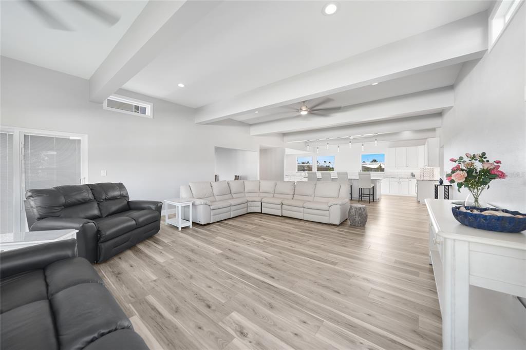 1450 New Point Comfort Road Englewood, FL 34223 - Photo 10 of 50 a living room with furniture and wooden floor