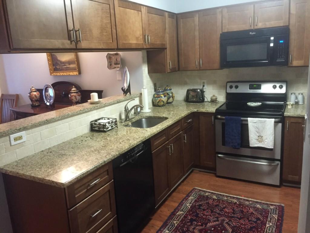 Kitchen with granite, updated cabinets, and updated appliances