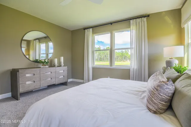 a bathroom with a bathtub and a sink