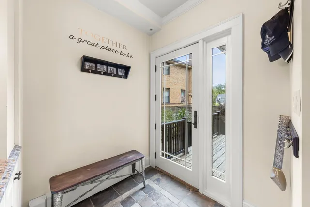 a hallway with a close up view of a living room
