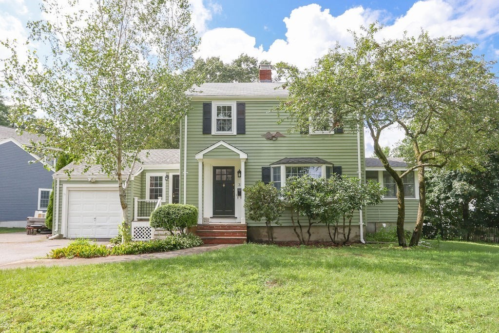3 Overlook Road Needham, MA 02492 - Photo 1 of 32 a front view of a house with a yard and porch