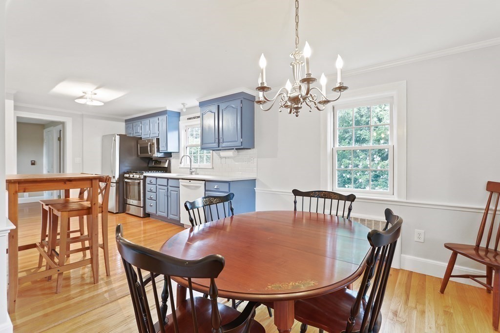 3 Overlook Road Needham, MA 02492 - Photo 11 of 32 a view of a dining room with furniture window and wooden floor