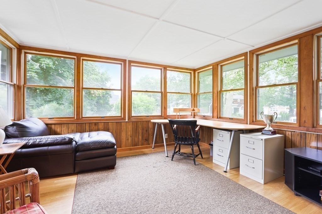 3 Overlook Road Needham, MA 02492 - Photo 12 of 32 a living room with furniture and a large window