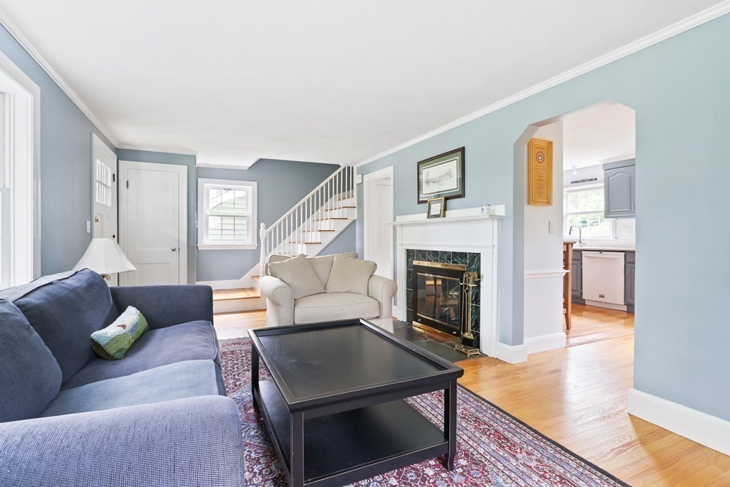 3 Overlook Road Needham, MA 02492 - Photo 16 of 32 a living room with furniture and a fireplace