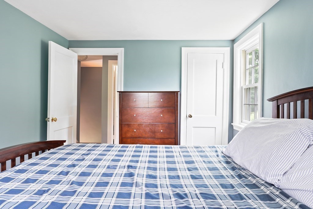 3 Overlook Road Needham, MA 02492 - Photo 24 of 32 a bedroom with a bed and a window