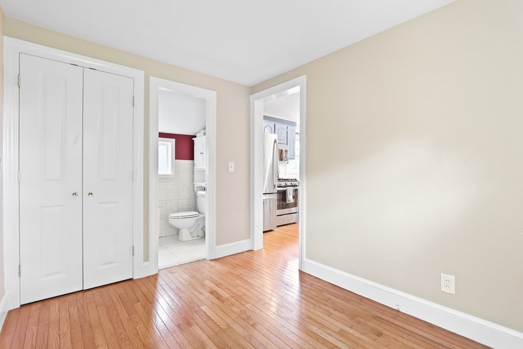 3 Overlook Road Needham, MA 02492 - Photo 3 of 32 a view of an empty room and wooden floor