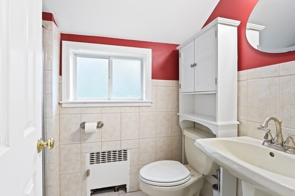 3 Overlook Road Needham, MA 02492 - Photo 5 of 32 a bathroom with a sink a toilet and shower