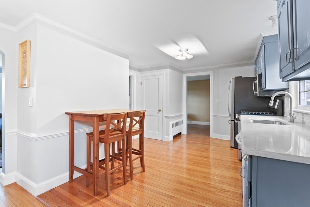 3 Overlook Road Needham, MA 02492 - Photo 9 of 32 a view of a dining room with furniture and wooden floor