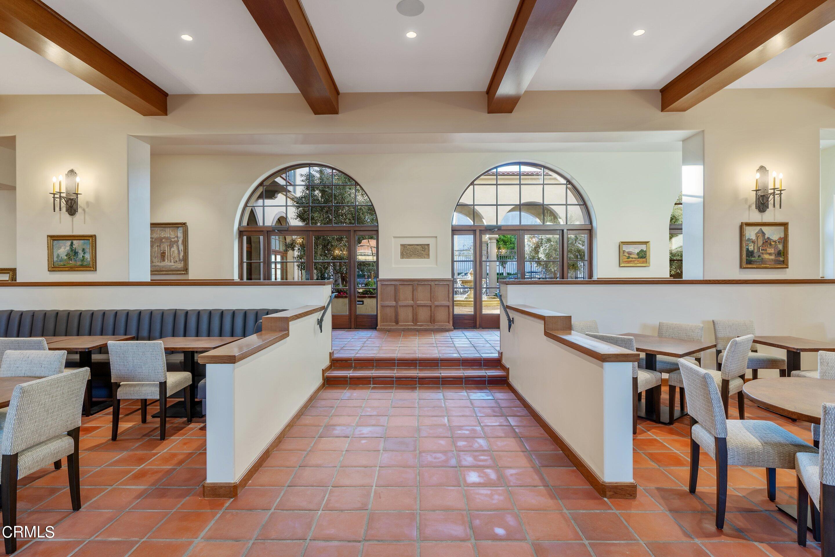 88 North Oakland Avenue, Unit 601 Pasadena, CA 91101 - Photo 19 of 50 a large hall with dining table and a large window