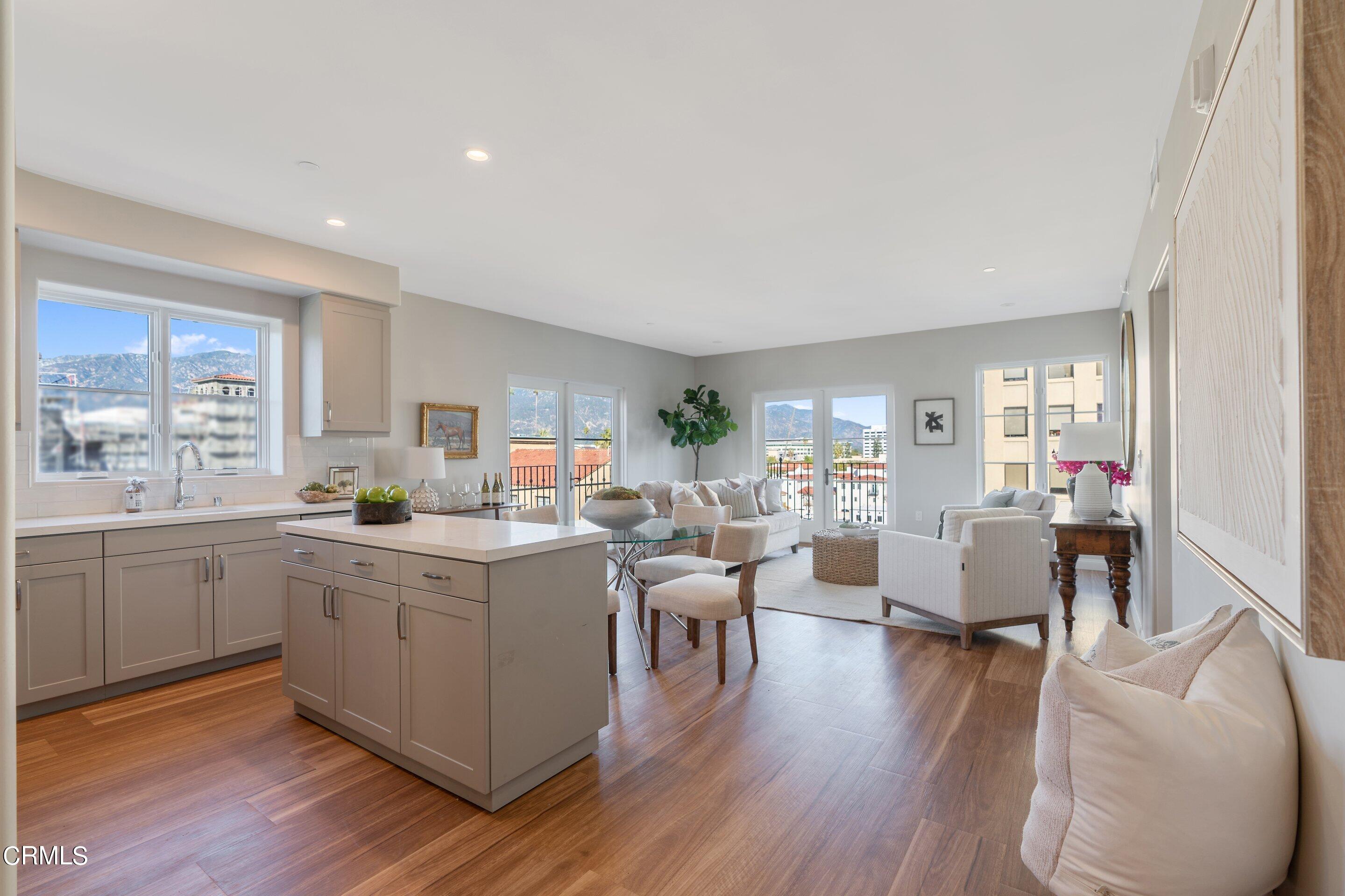 88 North Oakland Avenue, Unit 601 Pasadena, CA 91101 - Photo 25 of 50 a living room with furniture and wooden floor