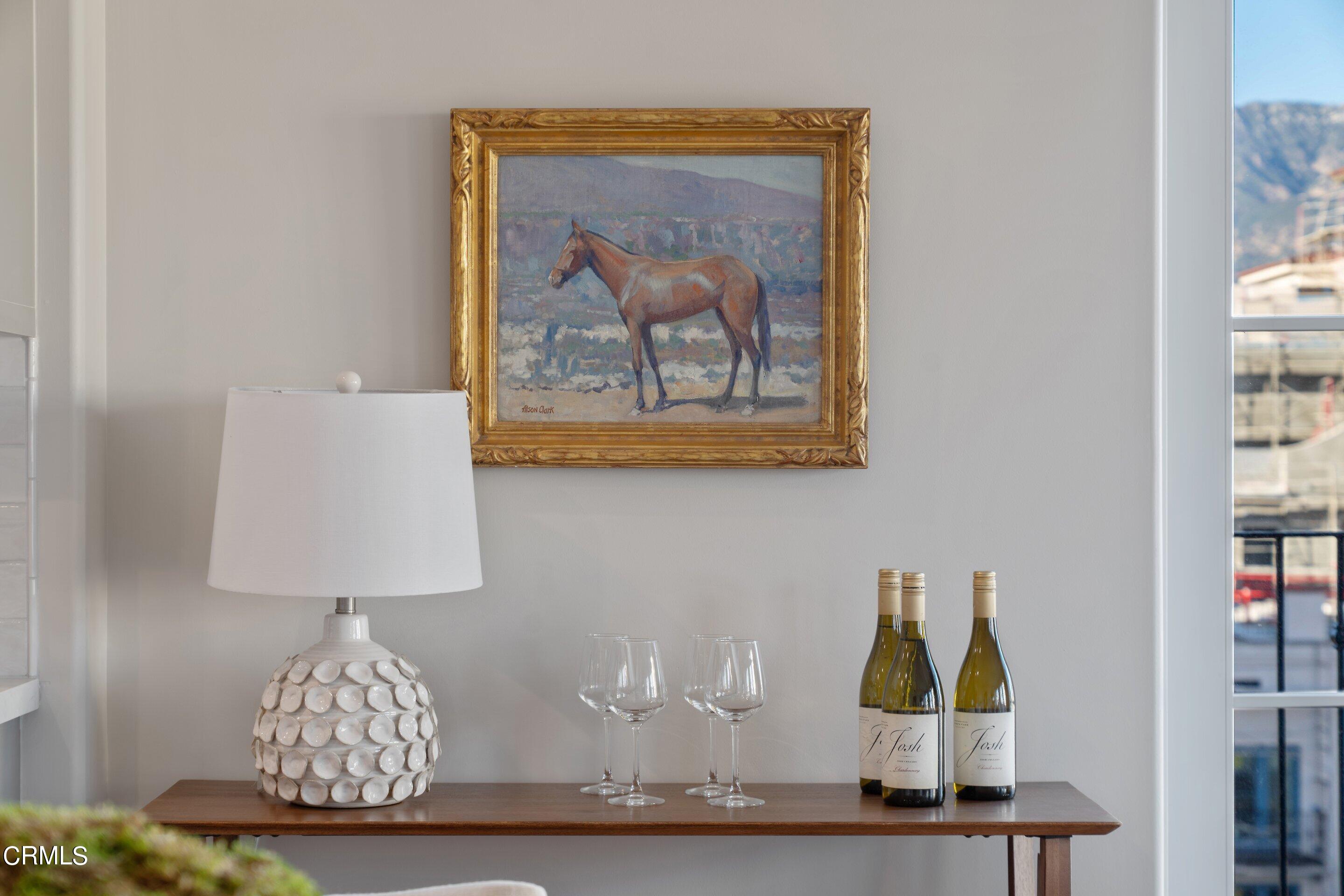 88 North Oakland Avenue, Unit 601 Pasadena, CA 91101 - Photo 33 of 50 a room with a painting on the wall and a lamp