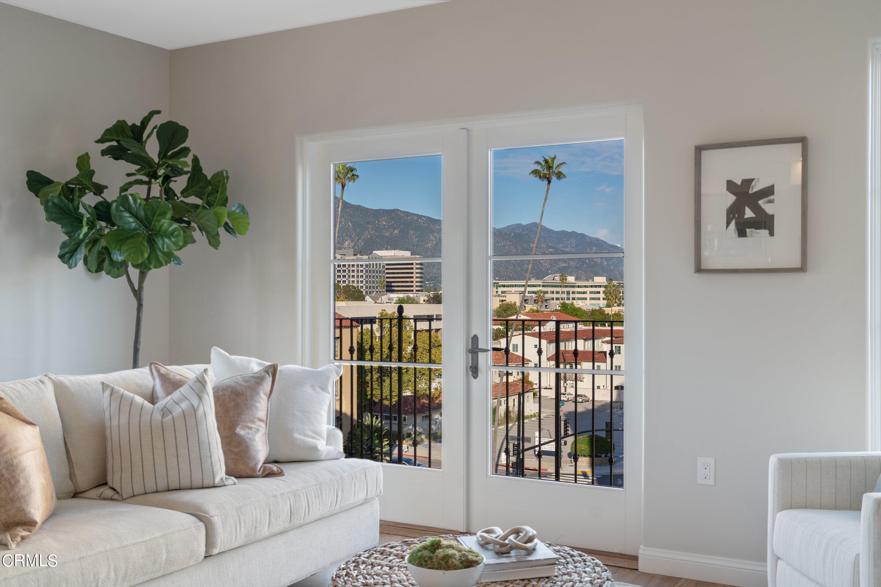 88 North Oakland Avenue, Unit 601 Pasadena, CA 91101 - Photo 35 of 50 a living room with furniture and a potted plant