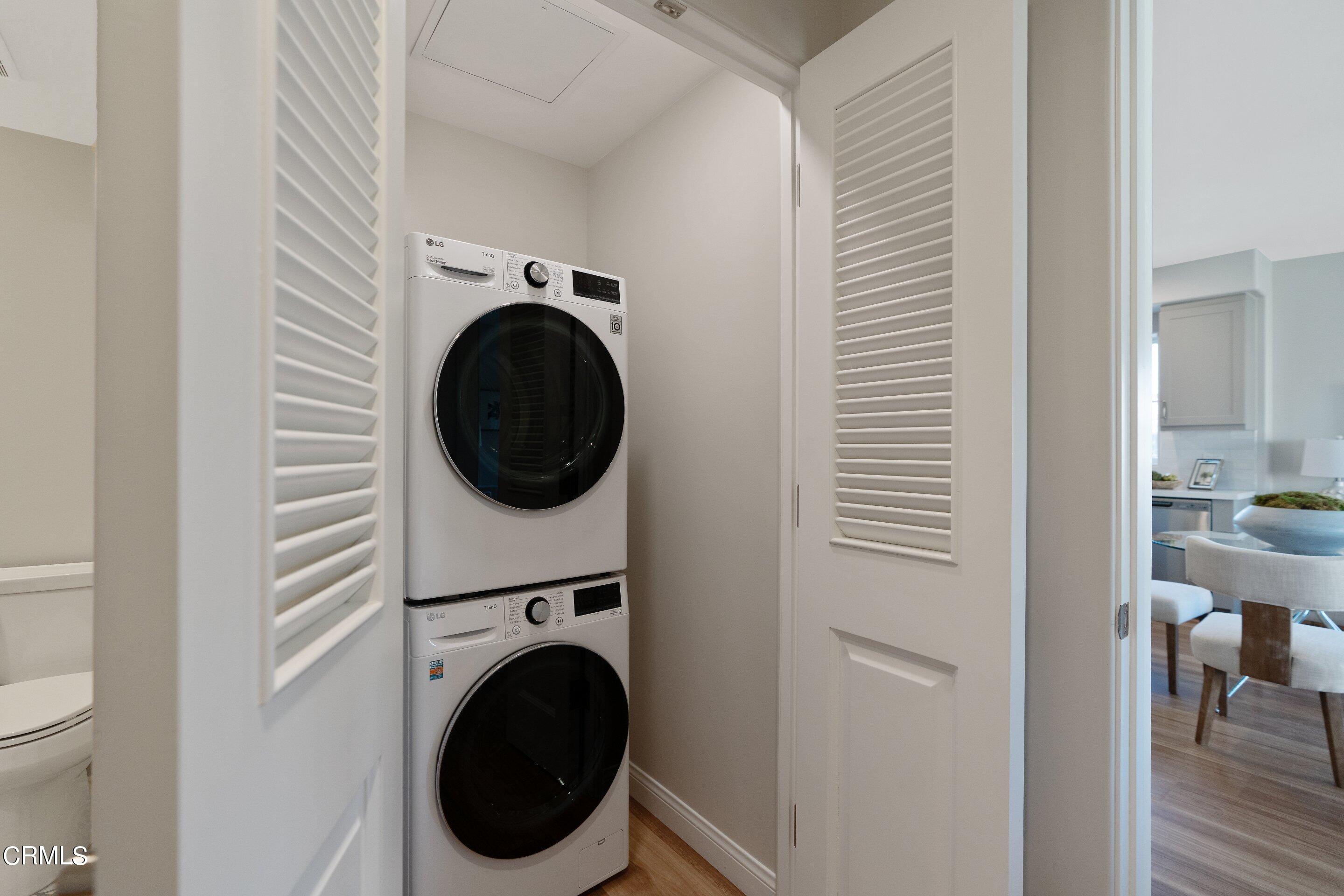 88 North Oakland Avenue, Unit 601 Pasadena, CA 91101 - Photo 44 of 50 a view of a hallway with washer and dryer