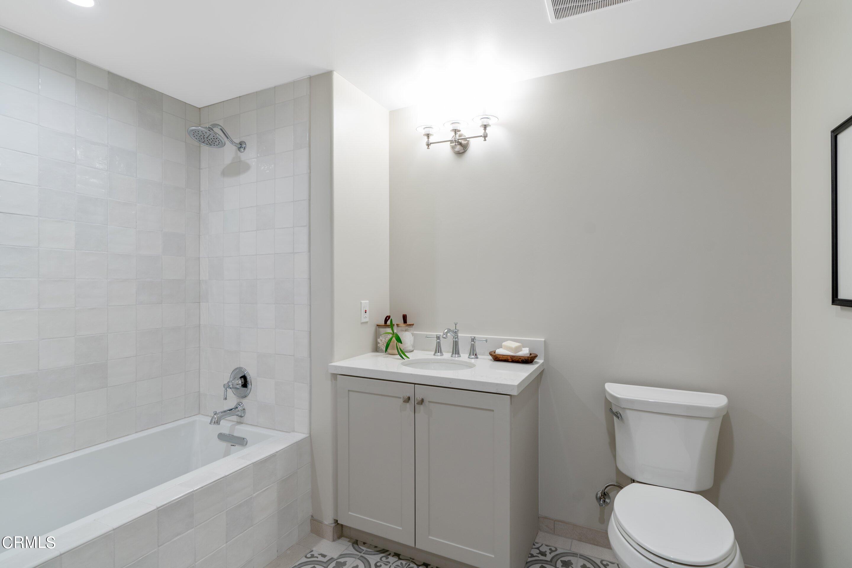 88 North Oakland Avenue, Unit 601 Pasadena, CA 91101 - Photo 47 of 50 a bathroom with a sink toilet and shower