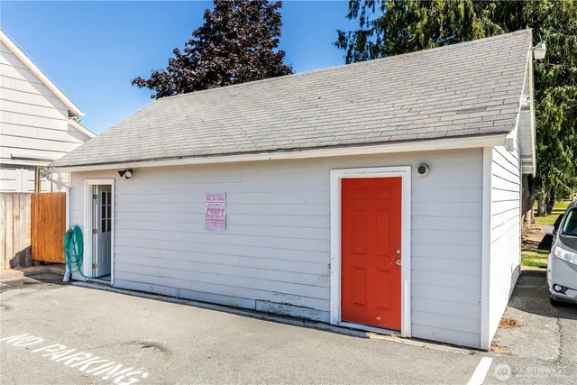 a view of a livingroom with chairs