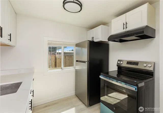 a bathroom with a toilet and shower