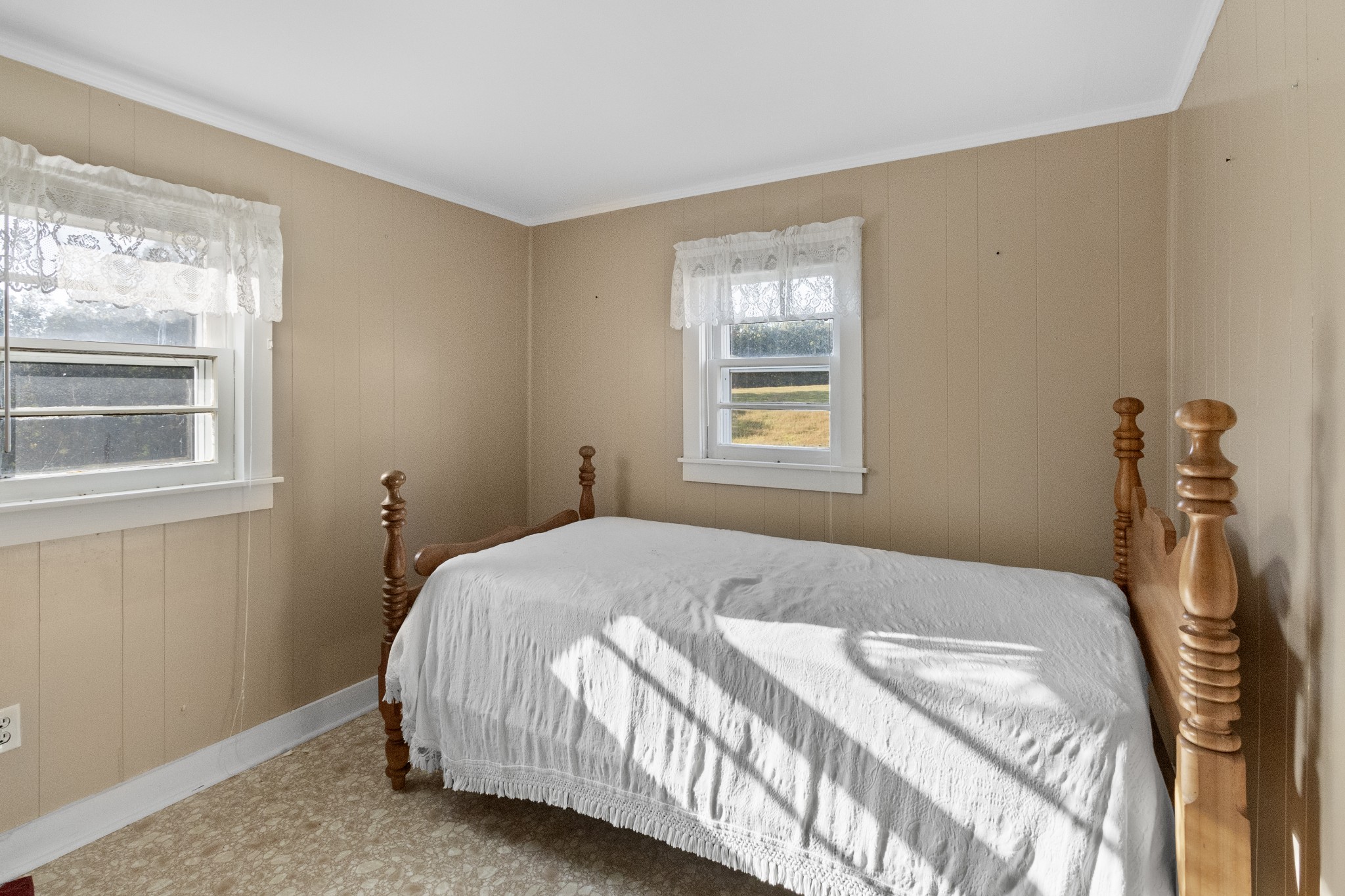 890 Wells Road Dickson, TN 37055 - Photo 11 of 34 a bedroom with a bed and a window