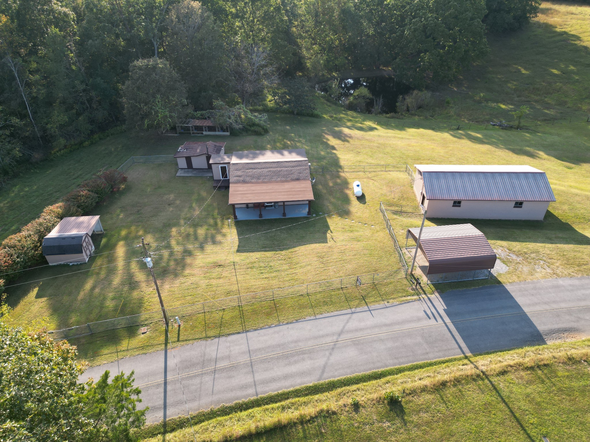 890 Wells Road Dickson, TN 37055 - Photo 17 of 34 a swimming pool with some trees