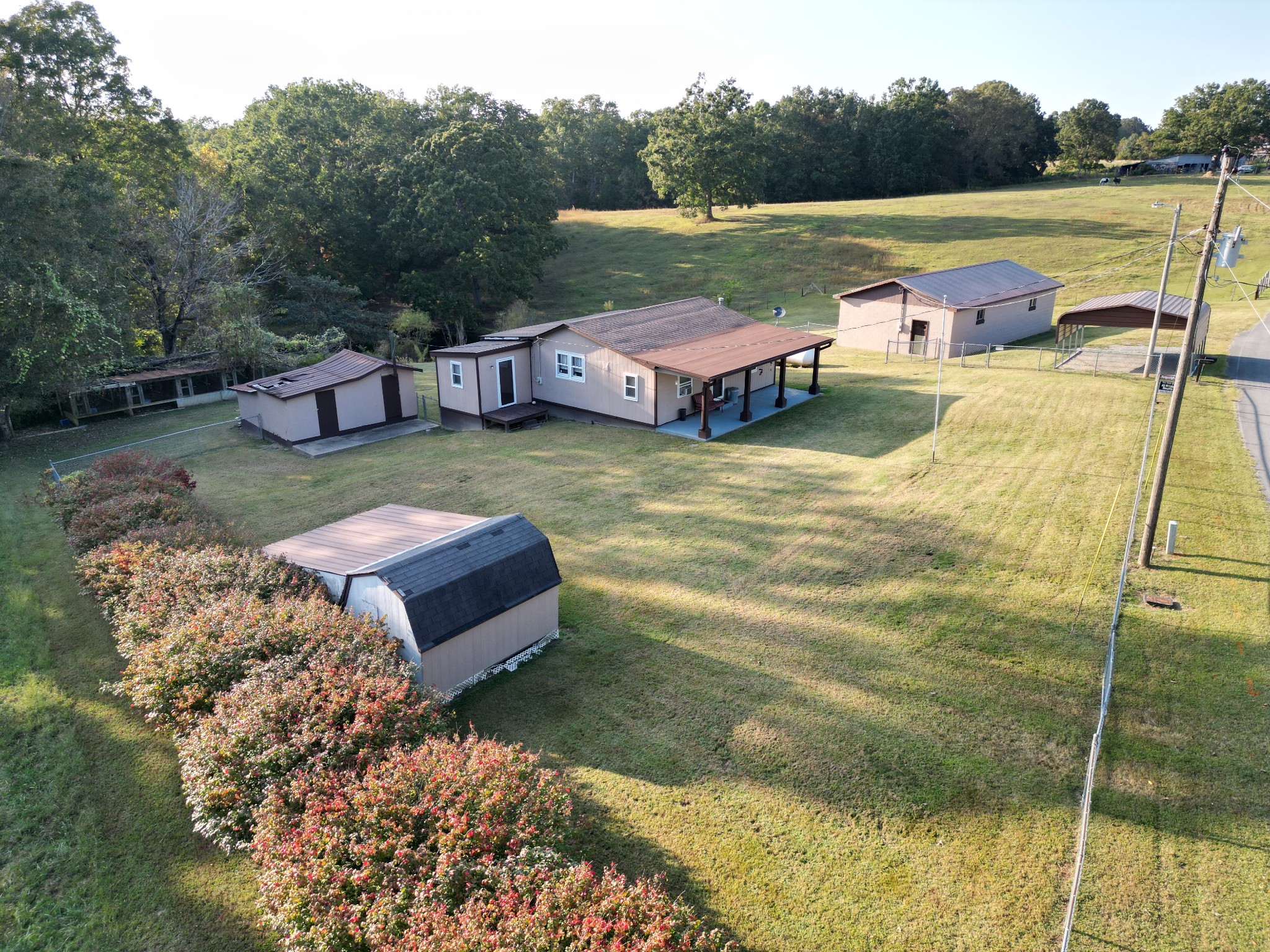 890 Wells Road Dickson, TN 37055 - Photo 25 of 34 a view of a lake with a yard