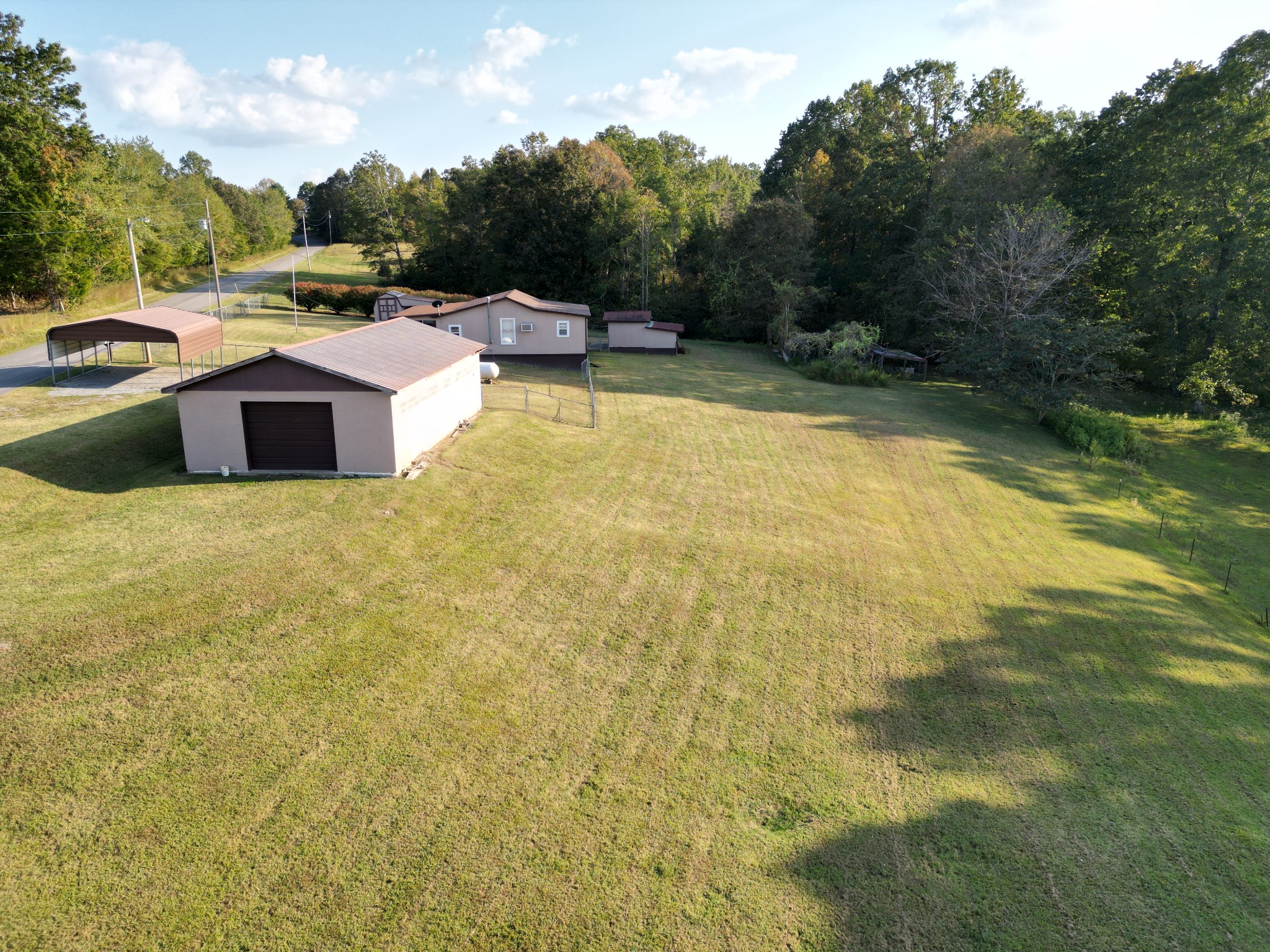 890 Wells Road Dickson, TN 37055 - Photo 29 of 34 a view of outdoor space yard and swimming pool