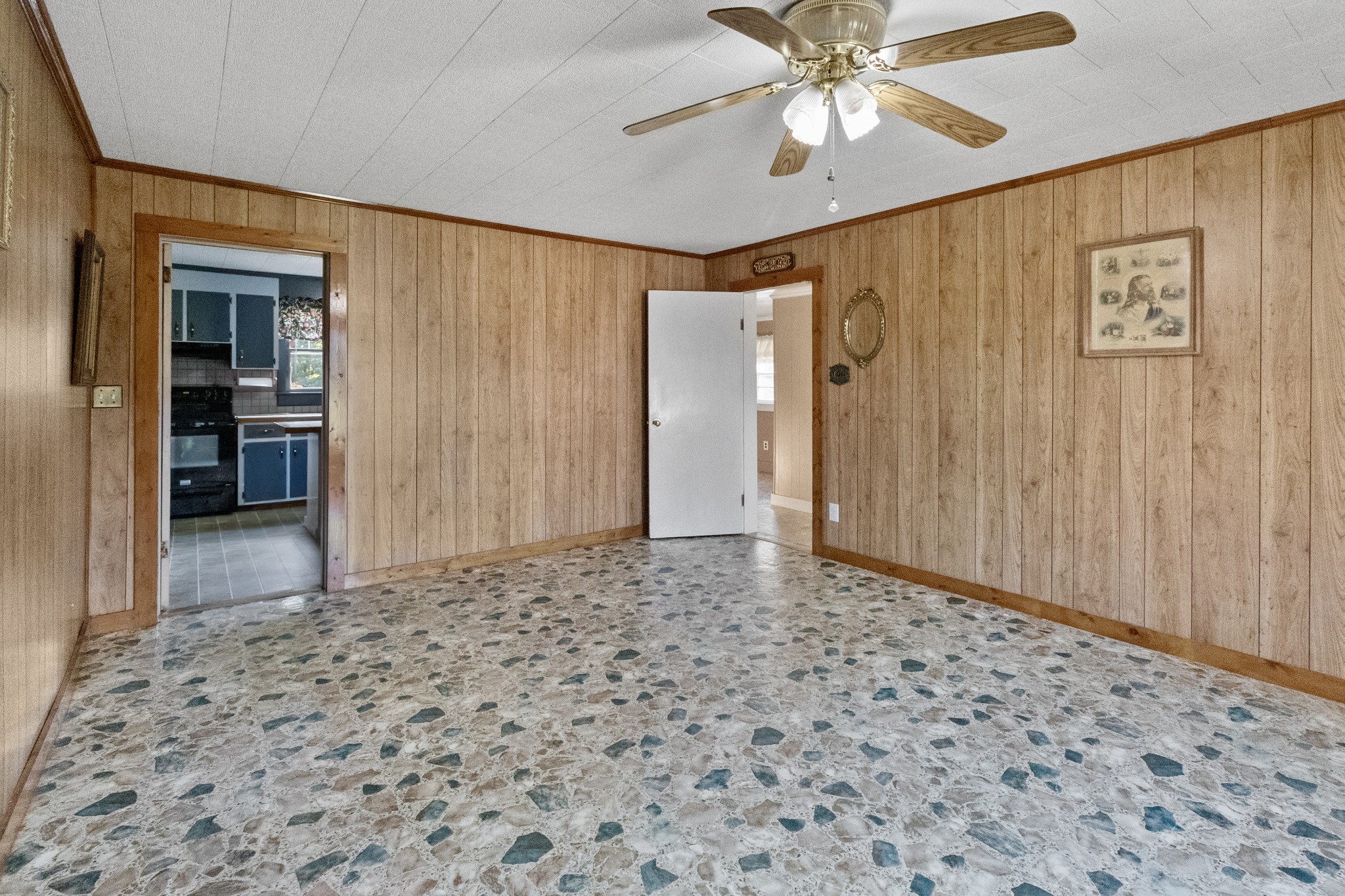 890 Wells Road Dickson, TN 37055 - Photo 5 of 34 a view of a livingroom with a chandelier fan and closet area