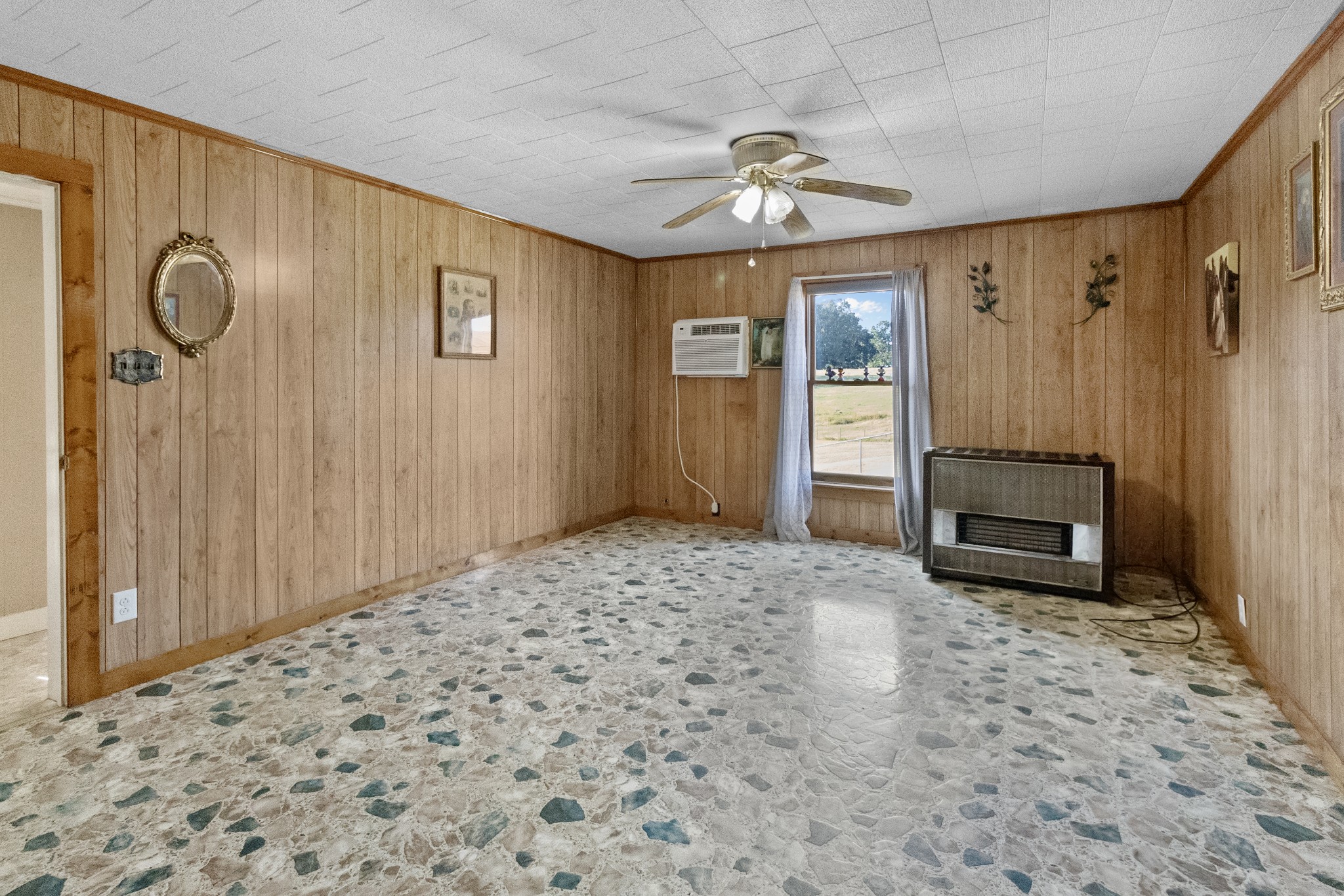 890 Wells Road Dickson, TN 37055 - Photo 6 of 34 a view of a hallway with wooden floor and chandelier