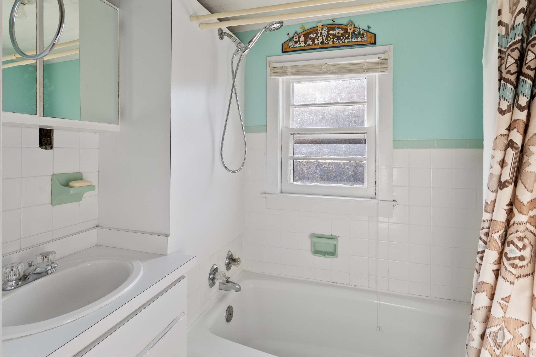 890 Wells Road Dickson, TN 37055 - Photo 10 of 34 a bathroom with a bathtub and a sink