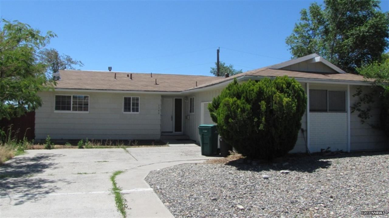 3340 Bryan Street Reno, NV 89503 - Photo 1 of 1 a front view of a house with a garden
