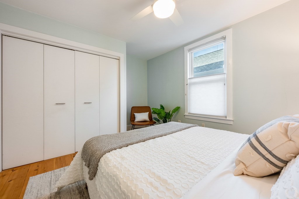 44 Roberts Road, Unit 2 Cambridge, MA 02138 - Photo 19 of 36 a bedroom with a bed and a window