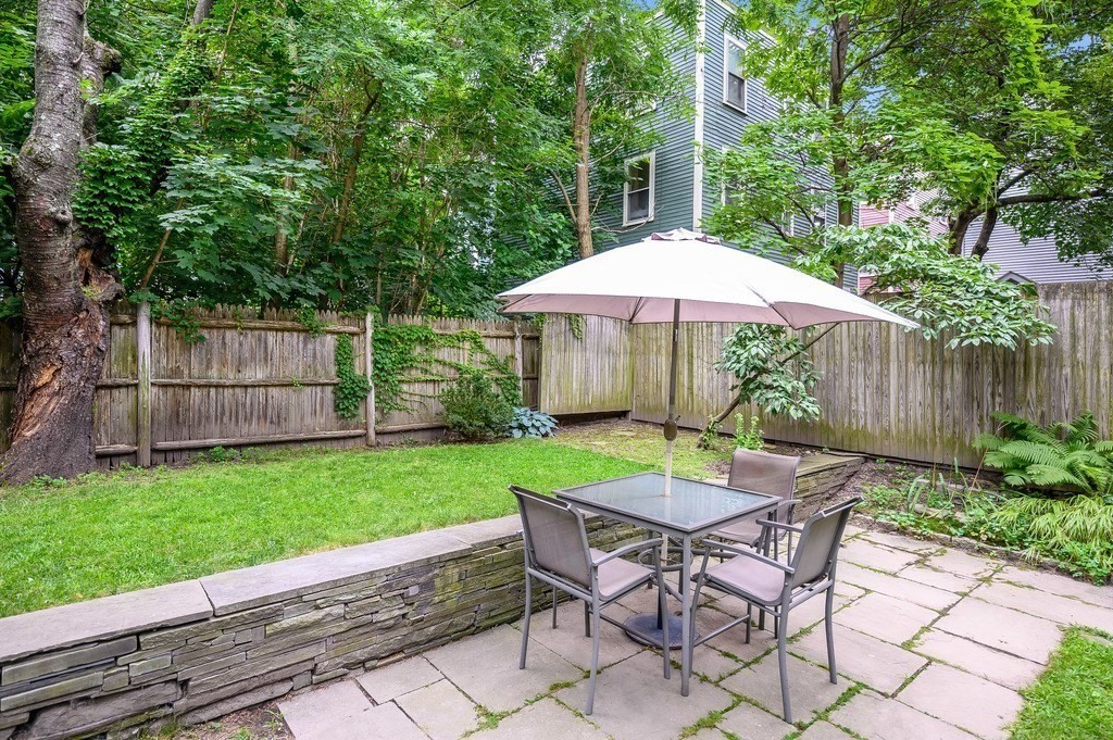 44 Roberts Road, Unit 2 Cambridge, MA 02138 - Photo 28 of 36 a view of backyard with seating and green space