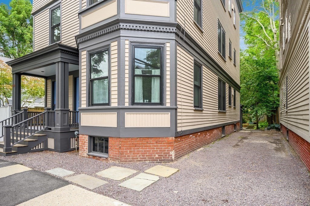 44 Roberts Road, Unit 2 Cambridge, MA 02138 - Photo 34 of 36 a view of a house with a small porch
