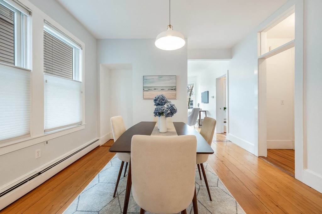 44 Roberts Road, Unit 2 Cambridge, MA 02138 - Photo 6 of 36 a dining room with furniture and wooden floor