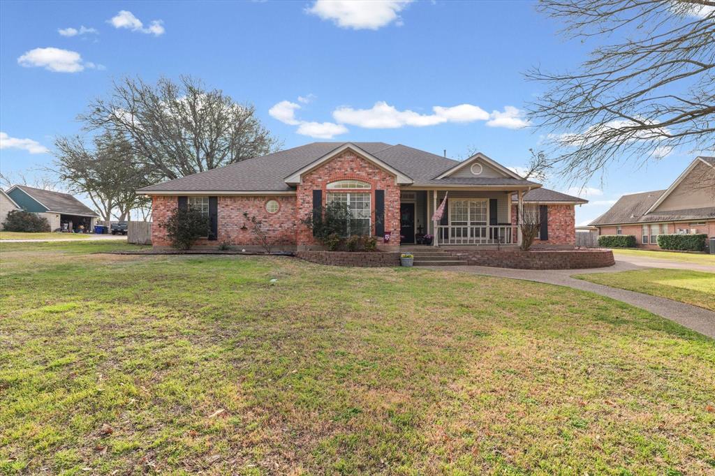 703 Gibraltar Lane Lorena, TX 76655 - Photo 1 of 39 a front view of a house with a yard