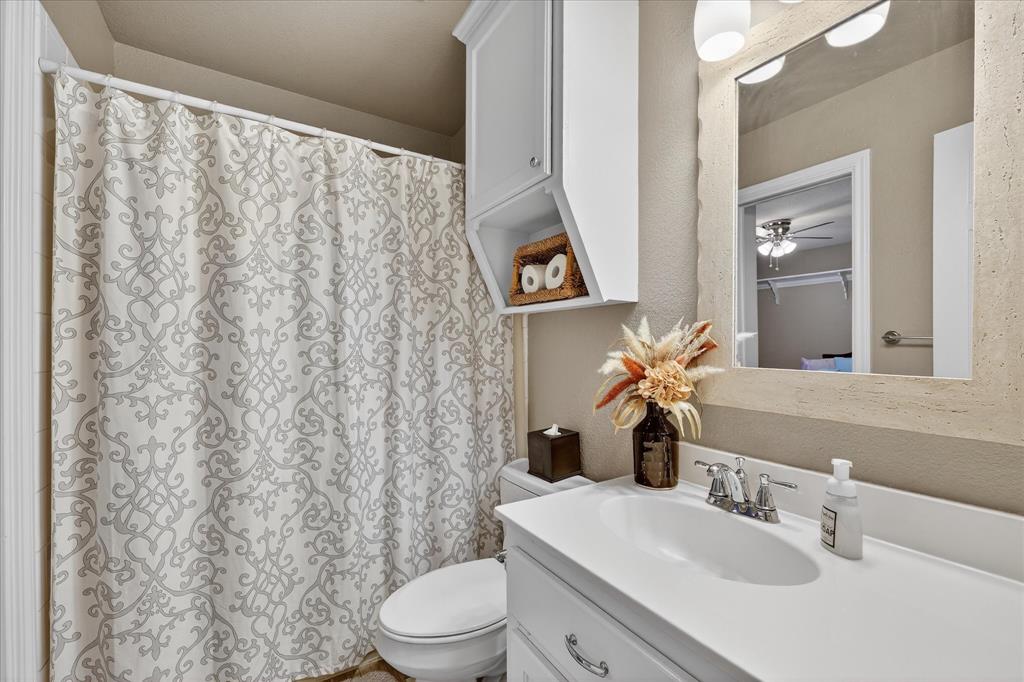 703 Gibraltar Lane Lorena, TX 76655 - Photo 15 of 39 a bathroom with a sink and a mirror