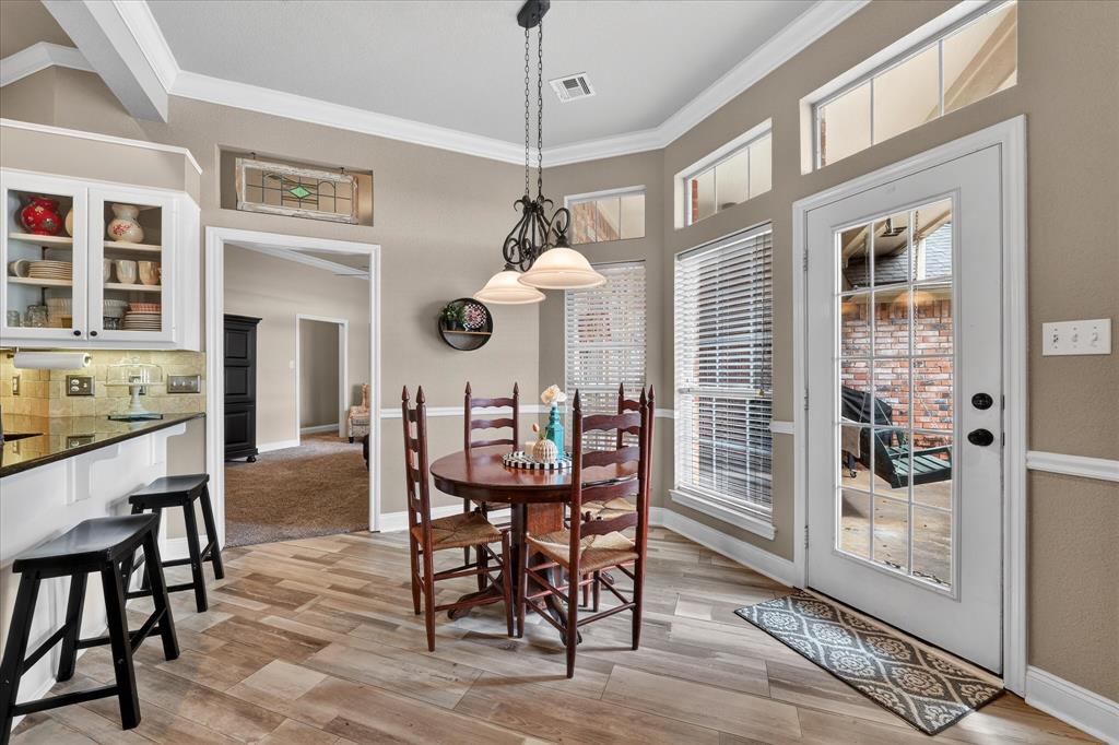 703 Gibraltar Lane Lorena, TX 76655 - Photo 26 of 39 a dining room with furniture and window