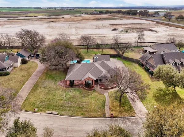 a view of swimming pool with a yard