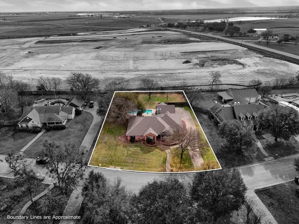 a view of a backyard of a house