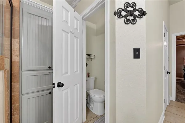 a bathroom with a toilet and a sink