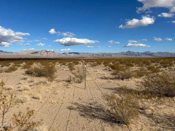 a view of a lake with a mountain in the background
