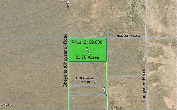 a sign that is on a brick wall