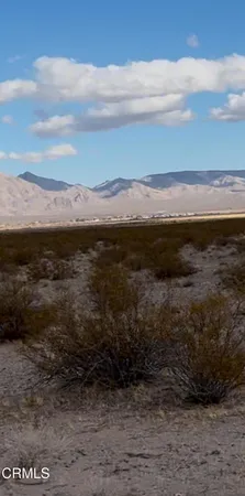 a view of a lake with a mountain