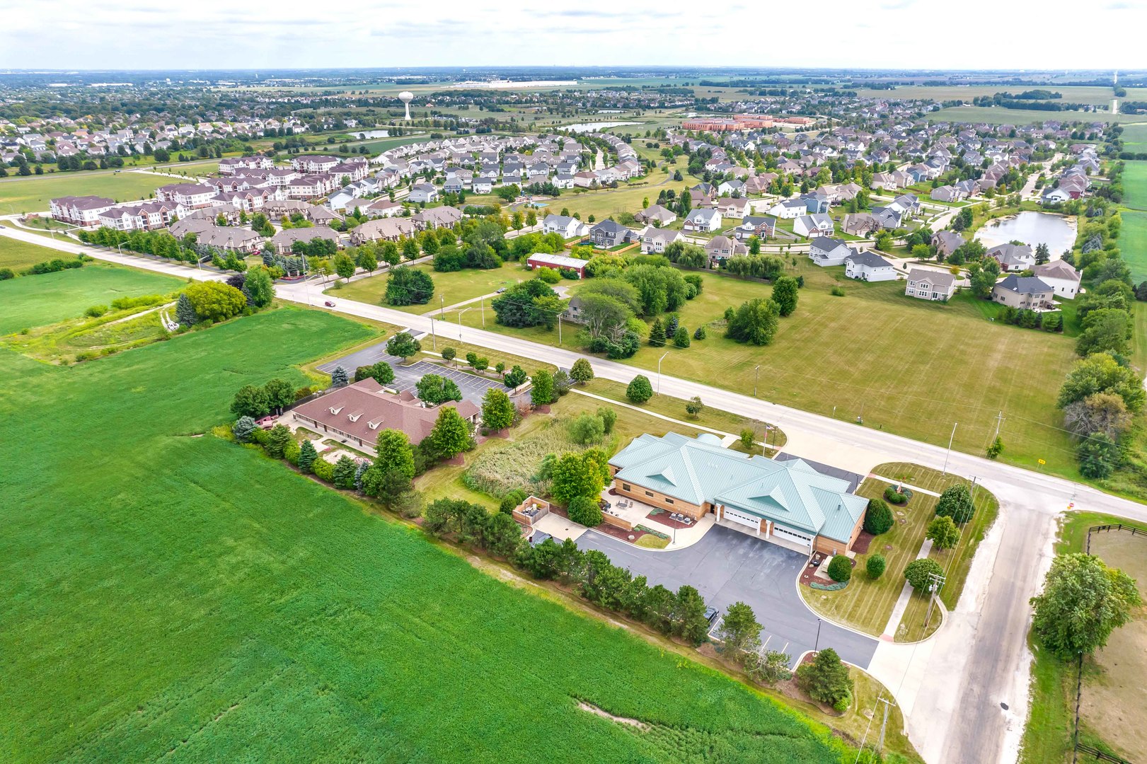870 Simons Road Plainfield, IL 60585 - Photo 13 of 14 an aerial view of a city with mountains